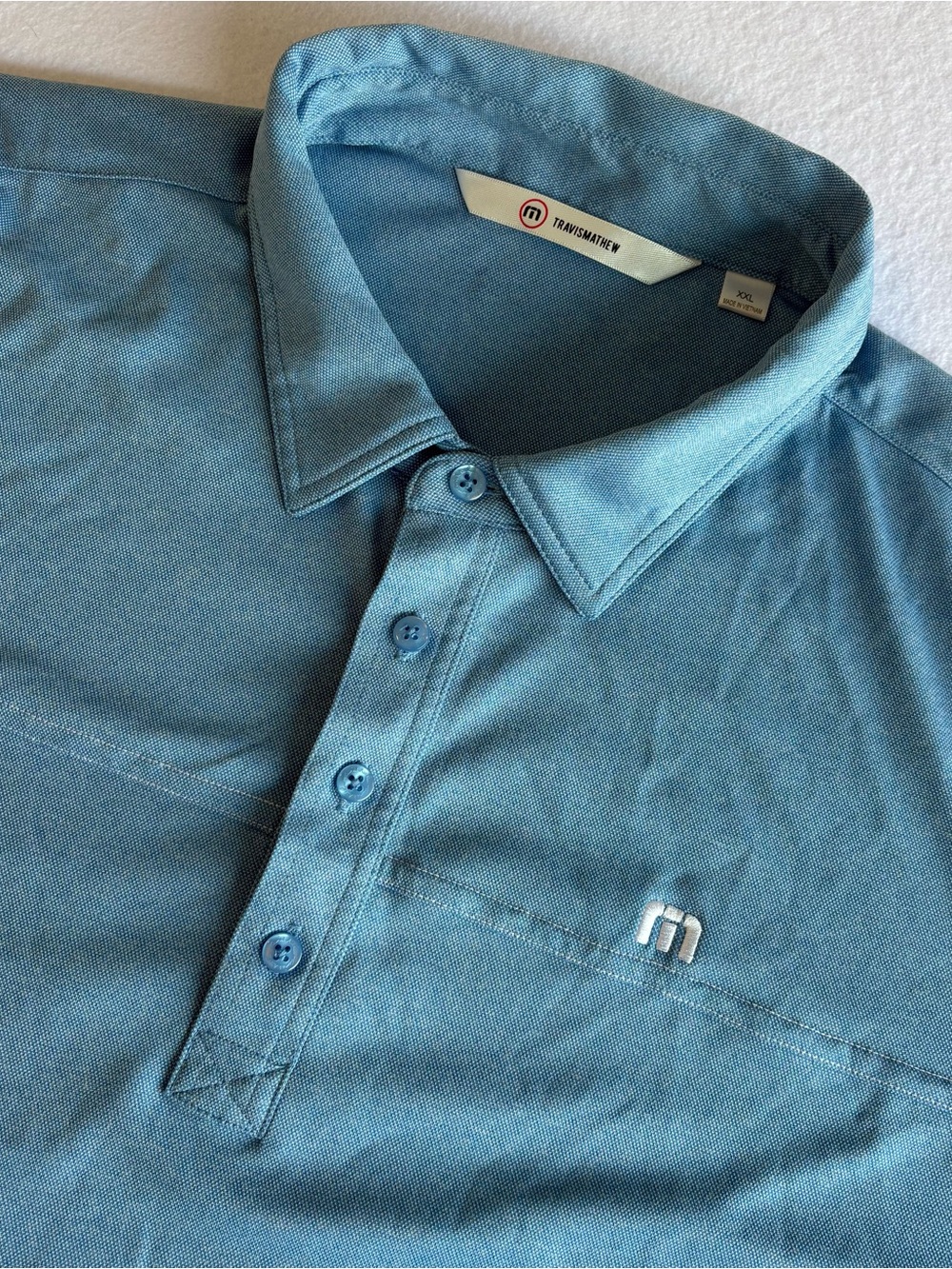 TravisMathew Blue Solid Logo Embroidered Golf Polo Shirt Men’s XXL Short Sleeve